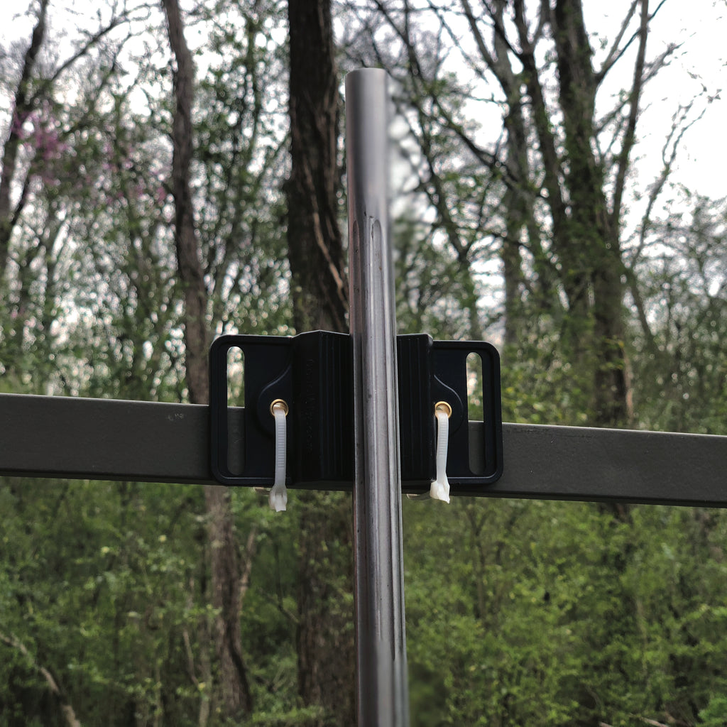 CoJo gun magnet mounted on a shooting rail in a ladder stand to hold a rifle.