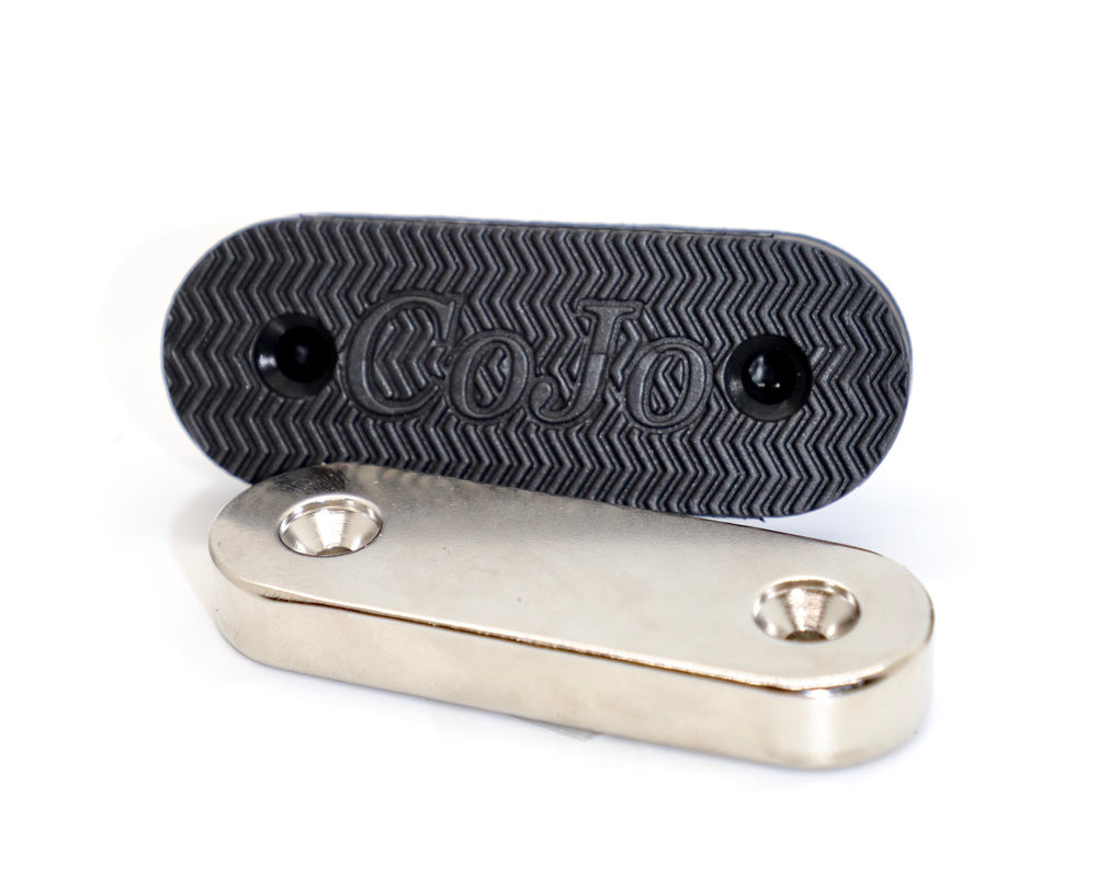 Picture of the outside coating of a CoJo Gun gripper gun magnet and the raw magnet that is inside the gun magnet.