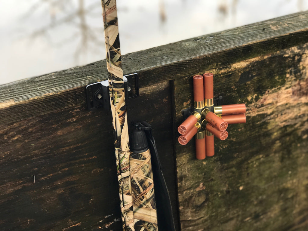 CoJo gun magnet holding a shotgun barrel in a duck blind